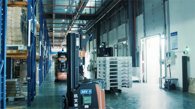 Hangcha reach truck AGV operating in a warehouse aisle